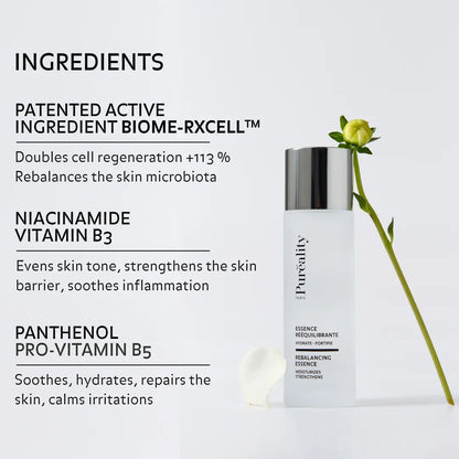 Promotional image of a Pureality Paris rebalancing essence bottle with a flower beside it. Text highlights key ingredients: patented BIOME-RXCELL™ (boosts cell regeneration and rebalances the skin microbiota), niacinamide (vitamin B3) to even skin tone and soothe inflammation, and panthenol (pro-vitamin B5) to hydrate, repair, and calm the skin.
