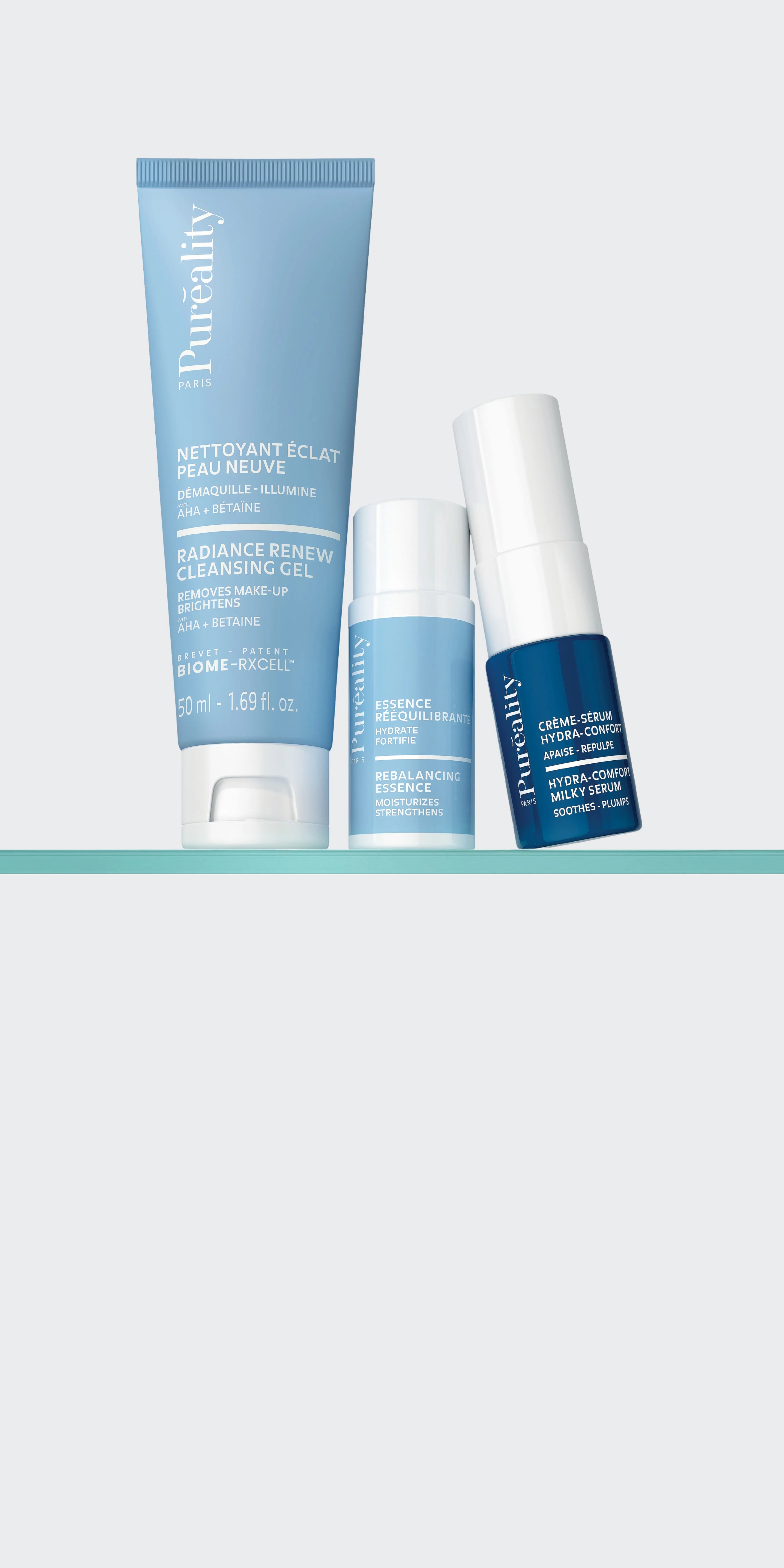 Trois soins visage Puréality (gel nettoyant, essence rééquilibrante et sérum hydratant) présentés ensemble, illustrant une routine complète pour hydrater, apaiser et renforcer la peau.